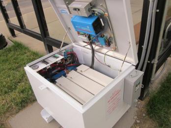Solar powered bus stop battery box and controls Solar powered bus stop battery box and controls